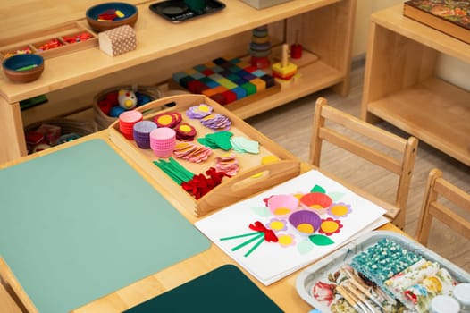 Classroom of Montessori kindergarten. The colorful Montessori material. Concept of children learning toy