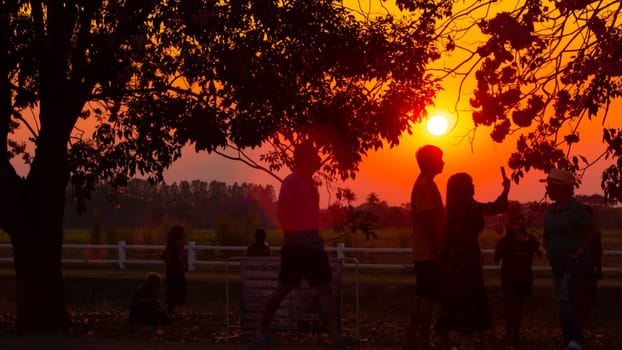 hot of loving young couple taking self portrait at sunset