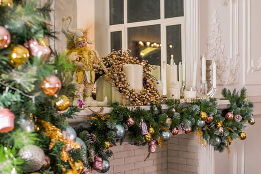 Christmas stocking hanging from a mantel or fireplace, decorated for Christmas with fire glowing.