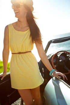 Travel road trip, beach car park and happy woman on holiday adventure, transportation journey or fun summer vacation. Driver freedom peace, blue sky flare and driving girl relax in Turkey countryside.