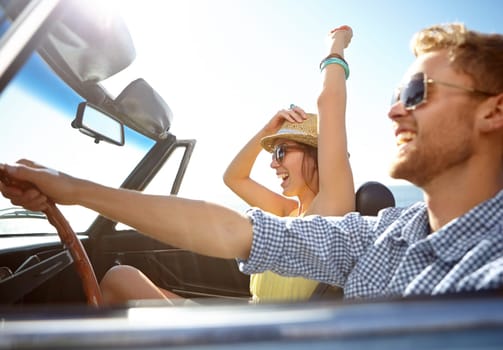 Travel, car road trip and profile couple on bonding holiday adventure, transportation journey or fun summer vacation. Love flare, convertible automobile and happy driver driving on Canada countryside.