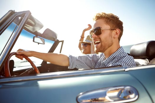 Car road trip, travel and fun happy couple on bonding holiday adventure, transportation journey or summer vacation. Love flare, convertible automobile driver and man and woman driving on Canada tour.