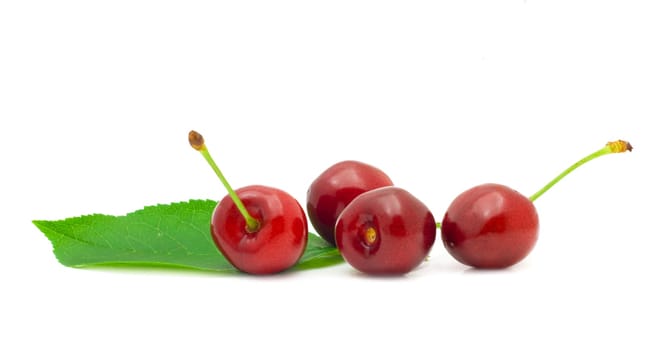 Ripe, juicy cherries on a white background
