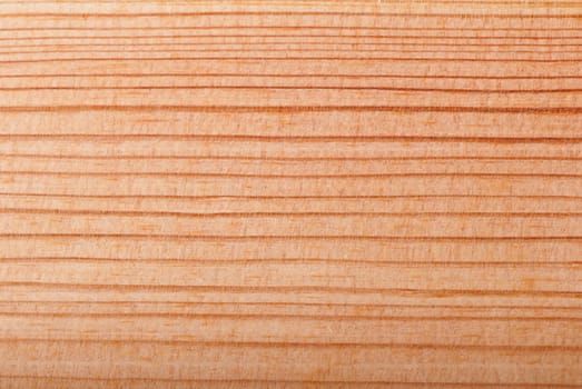 Brown wooden background close up. Surface of fresh wood, plywood.