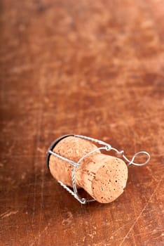 Old wine bottle corks on the wooden background.Vintage background with empty space for text