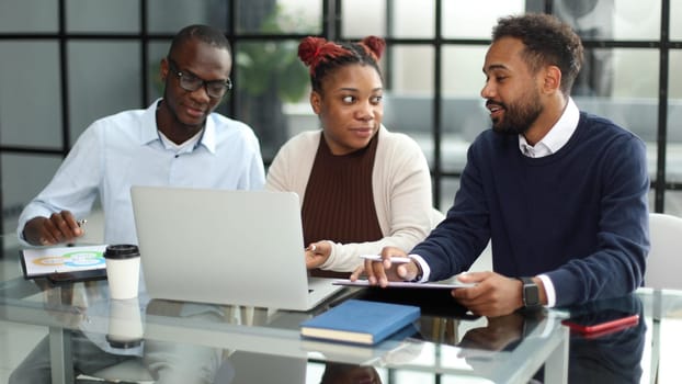 African american business team talking about strategy