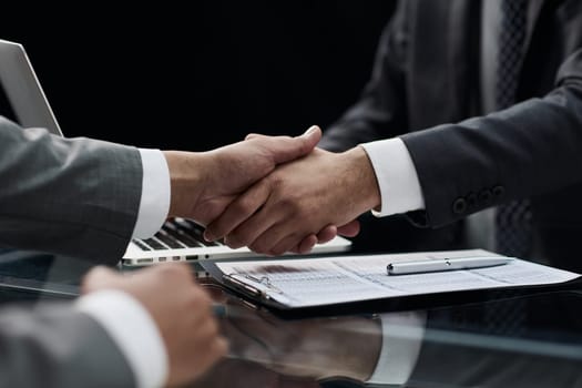 businessman shakes hands, making a deal with a lawyer. male judge legal