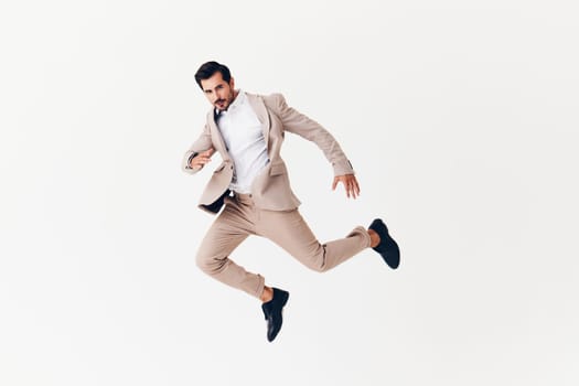 man suit arm stylish standing businessman smiling winner happy running sexy business flying confident victory occupation jacket person fashion tie beige male