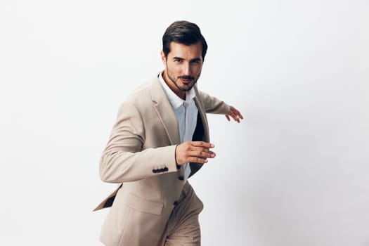 attractive man work copyspace professional flying jacket happy business winner suit office fashion victory flying businessman running job beige portrait hand smiling