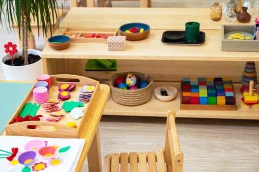 Classroom of Montessori kindergarten. The colorful Montessori material. Concept of children learning toy
