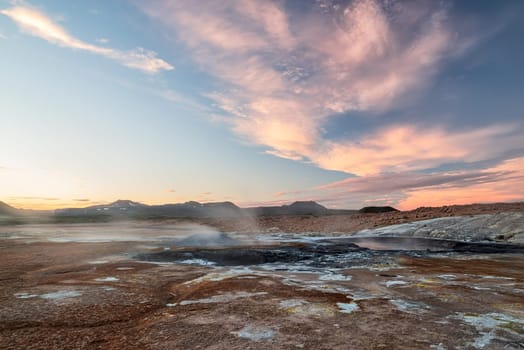 Boiling mudpots in Hverir geothermal area in Myvatn region, North of Iceland