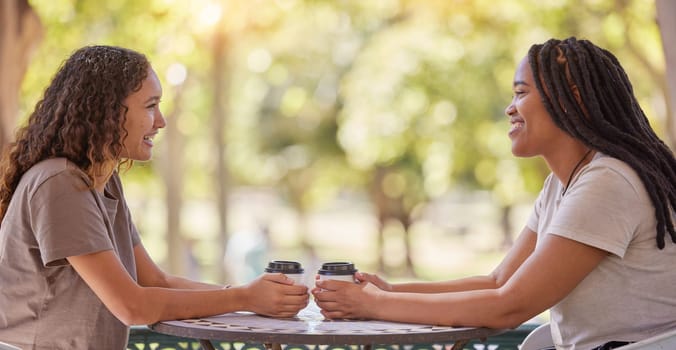 Woman, friends and conversation with coffee at cafe for social life, catchup or communication outside. Happy women enjoying friendly discussion, talk or gossip together in friendship at coffee shop.