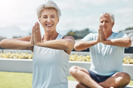 Senior couple, yoga and smile in meditation by the countryside for healthy spiritual wellness in nature. Happy elderly woman and man meditating in happiness for calm peaceful exercise in the outdoors.