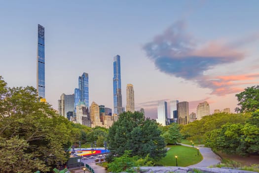 Central Park with Manhattan city skyline, cityscape of New York City USA in summer at sunrise