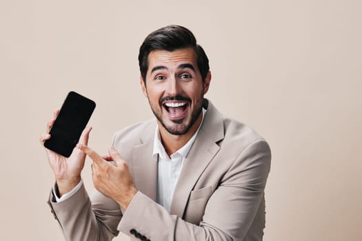 guy man smile mobile business lifestyle male space phone happy person call portrait corporate entrepreneur hold phone technology beige suit copy isolated smartphone