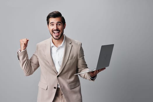 man person portrait using digital copyspace freelancer smiling business cheerful work wireless office suit computer job corporate typing internet professional laptop