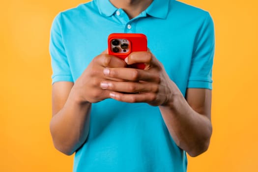 Close-up view of male hands, surfing internet on smartphone. Tech, social networks concept. High quality photo