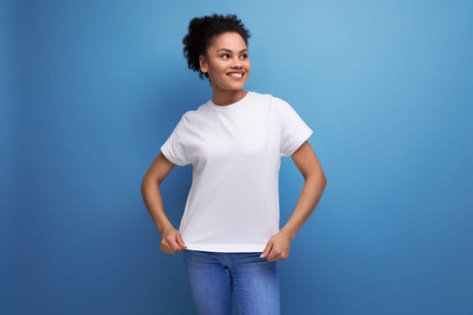 latin young woman dressed in white t-shirt with space for branding.