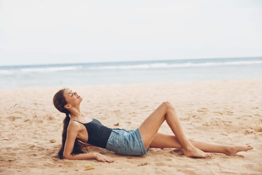 ocean woman smile alone girl sitting freedom tropical bali sand travel beach young holiday long hair nature sun sea vacation hair happy