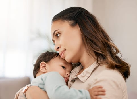 Family, love and mother carry baby for bonding, quality time and loving embrace together at home. New born, motherhood and calm mom holding infant for care, support and affection in living room.