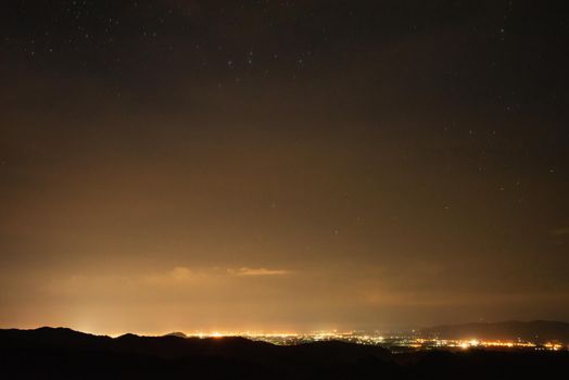 Milky Way light at mountains. Night colorful landscape.