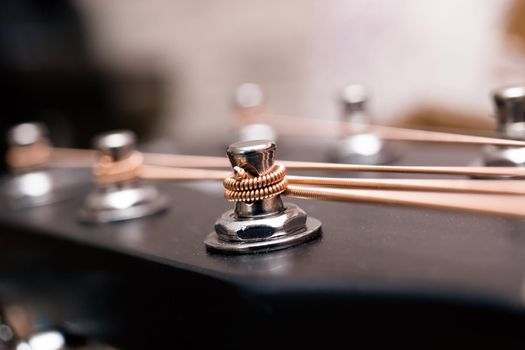 Black and yellow guitar strings close up macro photography