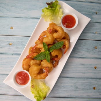Recipe for shrimp fritters in sweet and sour sauce, High quality photo