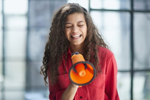 Portrait beautiful young business woman use megaphone