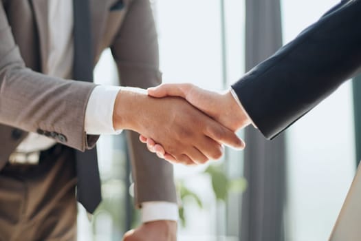 Business handshake and business people