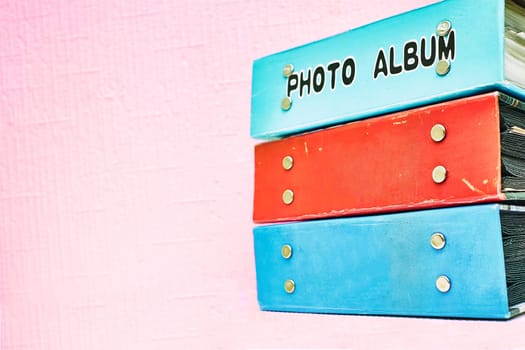 a blank book for the insertion of photographs, stamps, or pictures