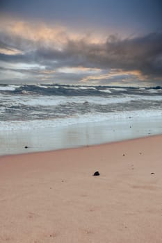 Baltic sea Dark blue clouds and sea or ocean water surface with foam waves before storm, dramatic seascape background. Incredible sunsets. Abstract natural pattern texture.