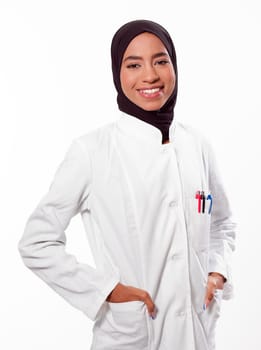 Portrait of muslim female nurse. Authentic Confident Middle Eastern Healthcare Worker. Middle age senior Arab nurse woman wearing hijab over isolated background. High quality photo