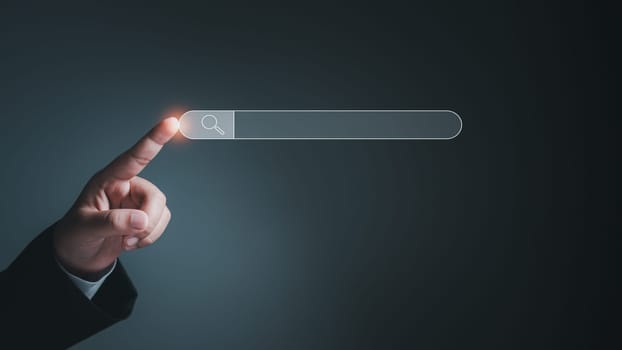 Search engine concept from network, information, job search. Businessman finger pointing to search tab.