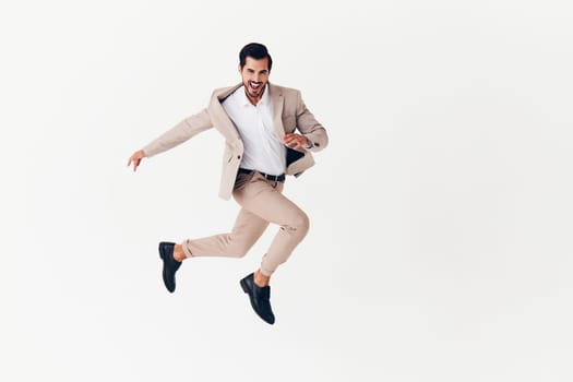 job man beige studio success business idea happy model male businessman victory stylish smiling occupation winner background running flying arm suit