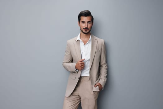 man white executive smiling suit beige arm copyspace formal happy business sexy male person portrait businessman handsome studio isolated confident successful