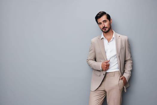 arm man happy isolated posing crossed attractive beige model business occupation portrait male confident businessman sexy suit copyspace smiling smile handsome