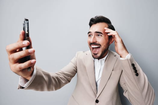 man success happy call portrait white technology smartphone hold smile handsome business cell suit entrepreneur selfies lifestyle confident phone background isolated