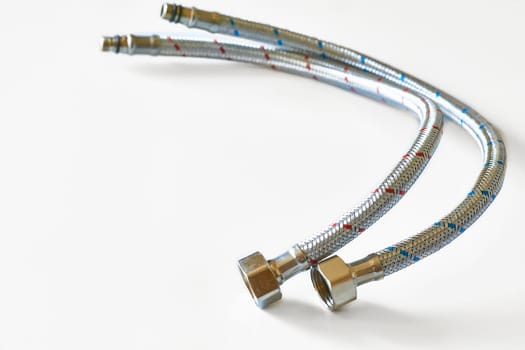 the system of pipes, tanks, fittings, and other apparatus required for the water supply, heating, and sanitation in a building