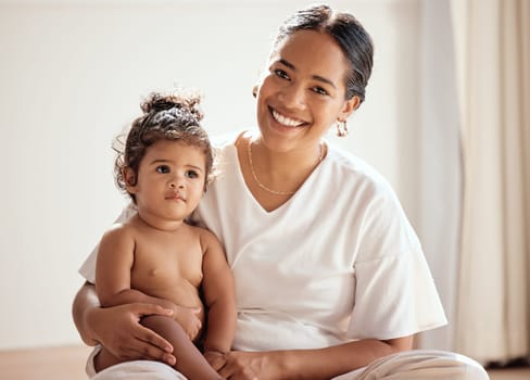 Baby, mother and portrait of loving parent with her little girl at home for relaxation and care. Bonding, woman and mom with child or kid in family home for happy family and mothers day.