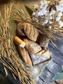 the composition of assorted bread products on the table.