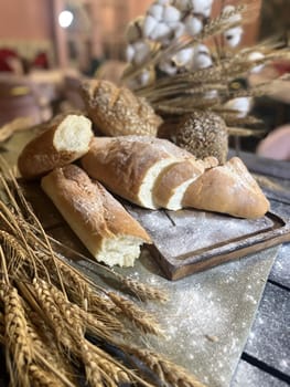 the composition of assorted bread products on the table.