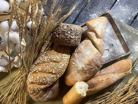 the composition of assorted bread products on the table.