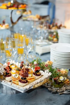 close-up of assorted canapes on the buffet table.