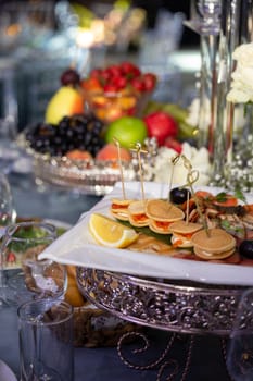 close-up of assorted canapes on the buffet table.