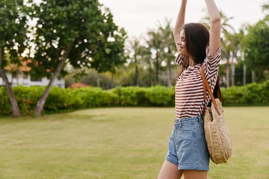 woman quiet summer beautiful meditation face long park hat fun nature freedom smiling walk hair girl lifestyle exercise natural hipster wellness t-shirt