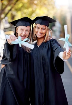 Graduation, education and portrait of friends with degree for academic success at university campus. Certificate, achievement and happy young women students with college diploma or scroll to graduate.