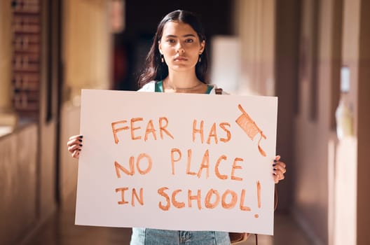 Woman, protest and poster for gun safety, stop fear in school and students freedom, government law and global justice. Portrait girl, sign and mass shooting problem, politics and support for change.