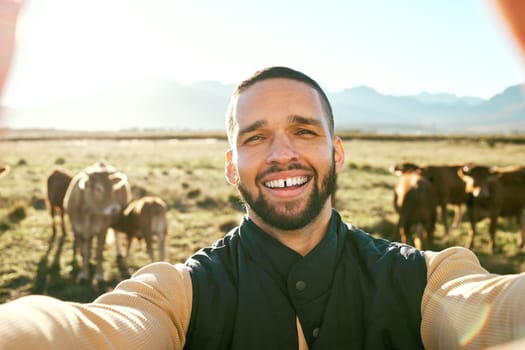 Man, farm and portrait smile for selfie in the countryside with live stock, cows or production for agriculture growth. Happy male farmer smiling for travel, farming or photo in nature with animals.