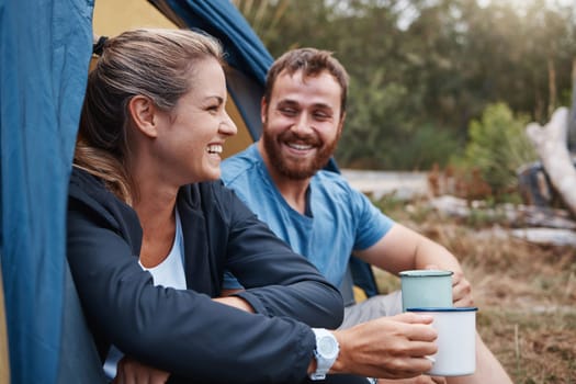 Couple, bonding or drinking coffee in camping tent in nature earth environment, Canada woods or sustainability forest. Smile, happy woman or laughing man with tea on romance love date in countryside.