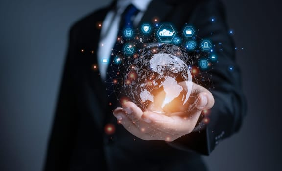 businessman holding globe with virtual Global Internet connection. global internet connection application technology and digital marketing, big data, Financial and banking, Digital link tech.